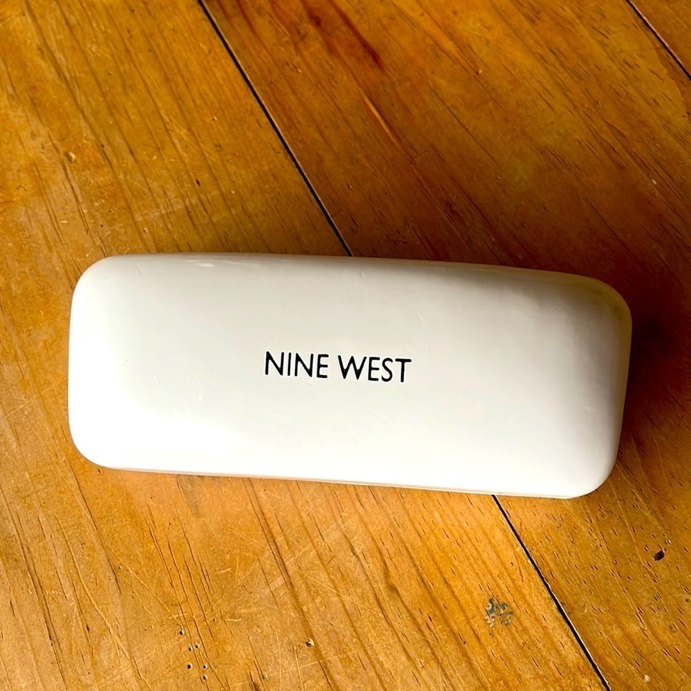 Nine West white patent leather like eye/ Sunglass case. Excellent condition